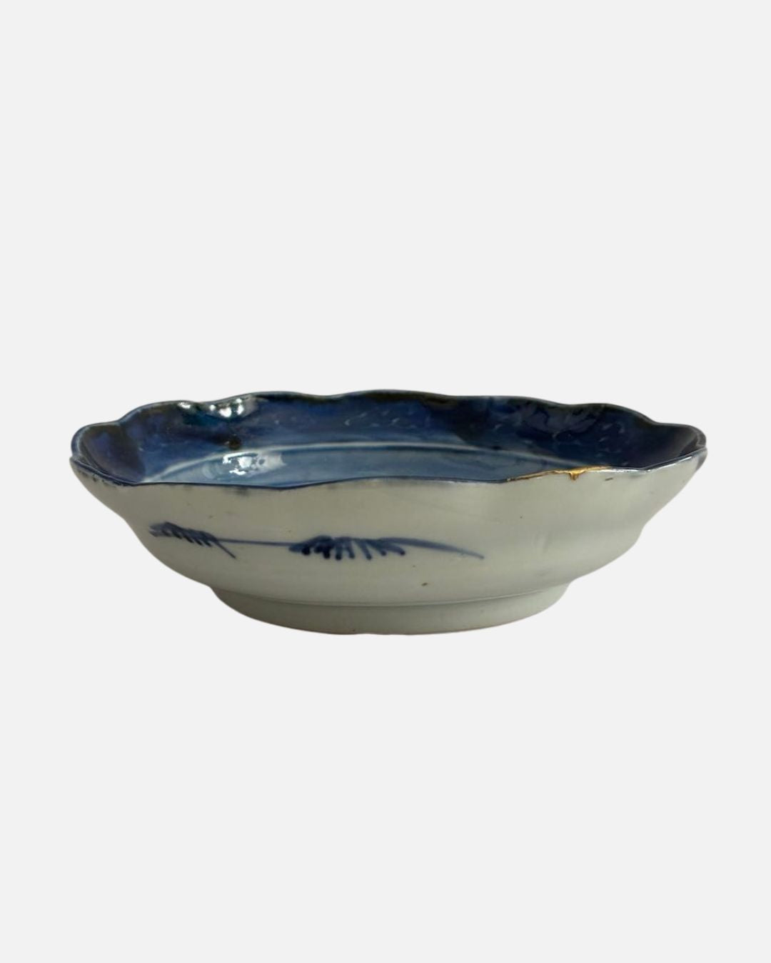 Assiette creuse bleue motif paysage